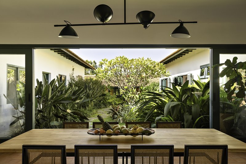 Pinheiro Farm / Equipe Lamas - Interior Photography, Table, Lighting, Chair, Glass