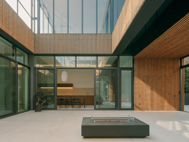 serrated charred wood shell encloses suburban residence on the hills of tbilisi